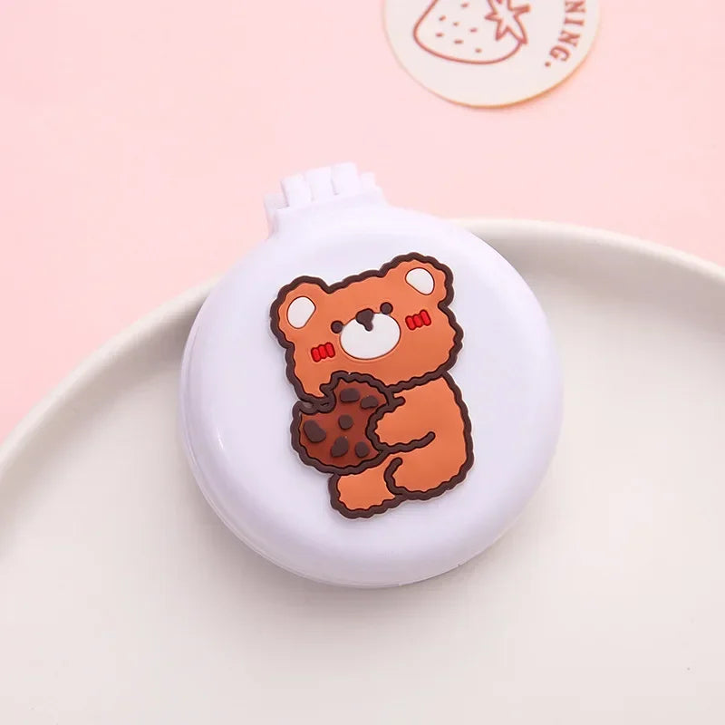 Miroir de Poche Pliant avec Brosse à Coussin d'Air, 22 Motifs