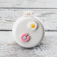 Miroir de Poche Pliant avec Brosse à Coussin d'Air, 22 Motifs