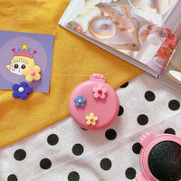 Miroir de Poche Pliant avec Brosse à Coussin d'Air, 22 Motifs